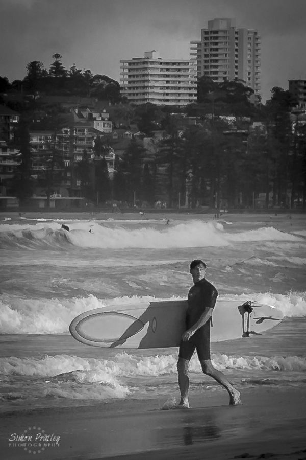 Man with Surfboard